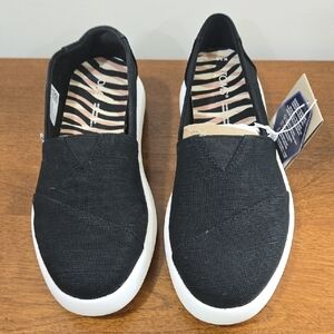 Toms Black Canvas Slip-Ons with White Soles